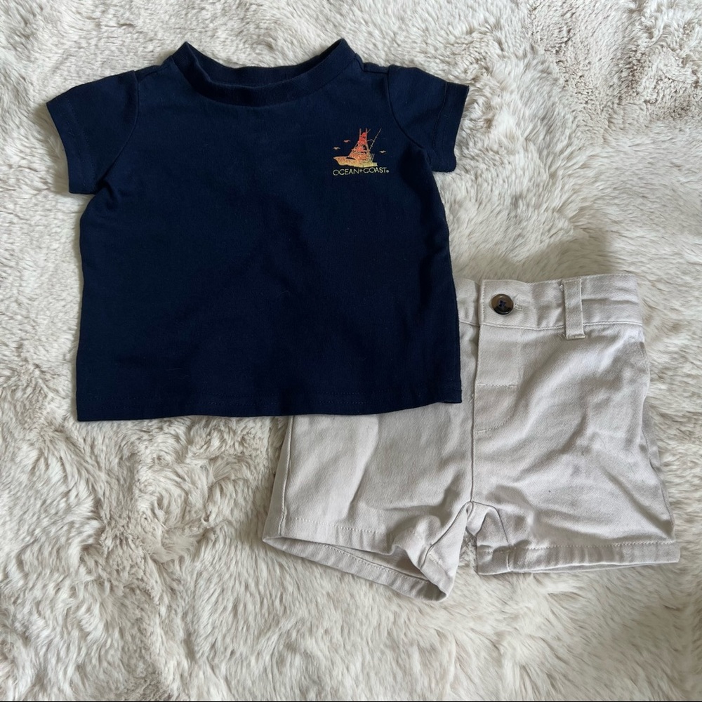 Khaki shorts and blue sailboat print fishing shirt ocean coast